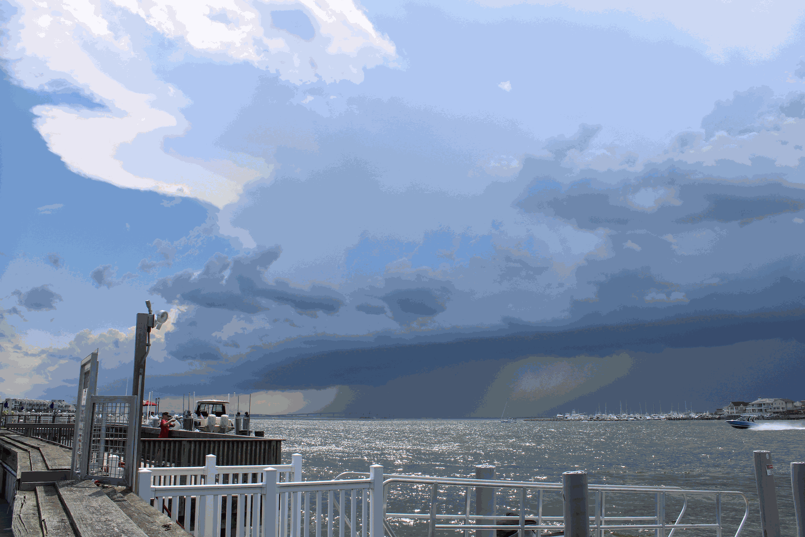 Thunderstorm clouds over the water